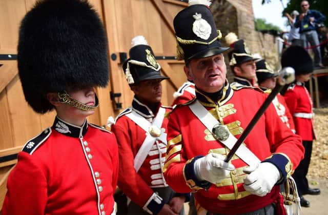 Re-enactors dressed as British soldiers take part in the re-opening ceremony of Hougoumont Farm. Picture: AFP/Getty