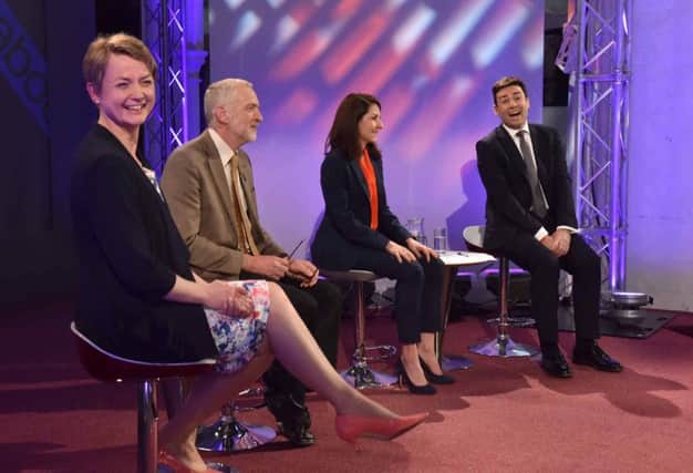 From left, Cooper, Corbyn, Kendall and Burnham enjoy a lighter moment at the televised debate. Picture: PA