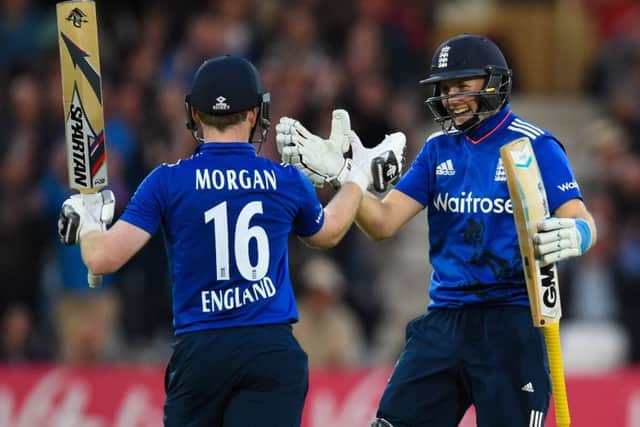 Centurions Eoin Morgan and Joe Root celebrate. Picture: Stu Forster/Getty
