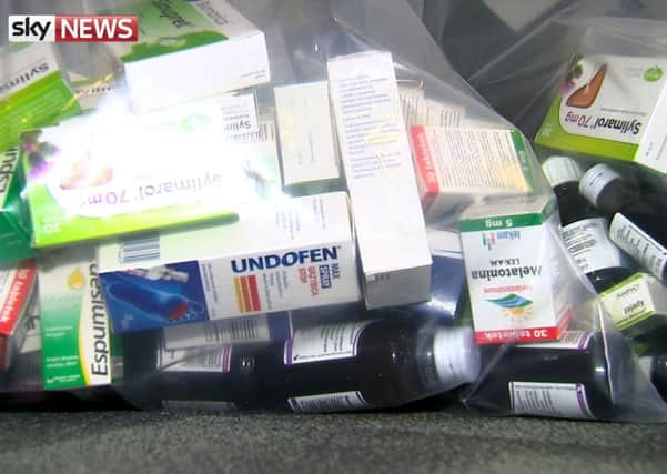 Police and Medicines and Healthcare Products Regulatory Agency officials raided a flat in Leith as part of an international crackdown on illegal and unlicensed drugs  Pictures: Sky News