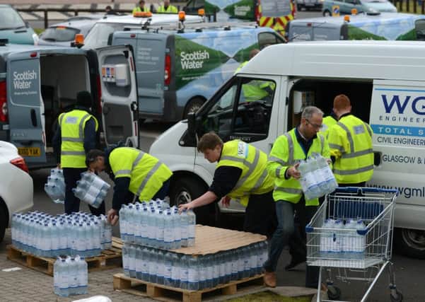 The scene at Lidl in Carfin where a water point has been set up by Scottish Water. Picture: Hemedia
