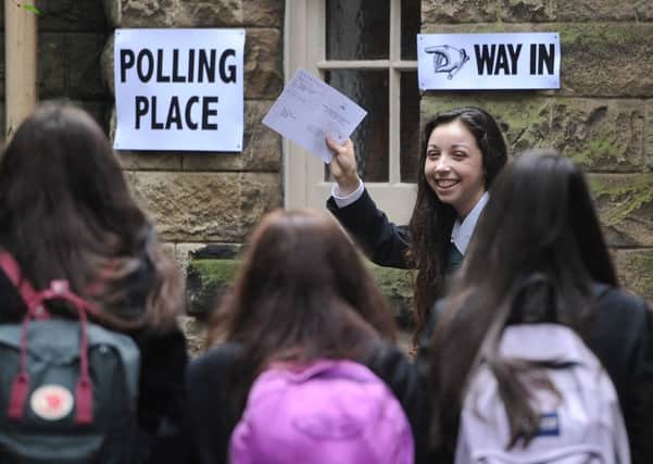 16 year old voters casting their vote in the Scottish independence referendum. Picture: Neil Hanna