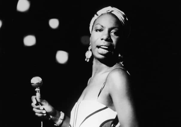 American pianist and jazz singer Nina Simone performs October 18, 1964. Picture: Getty Images