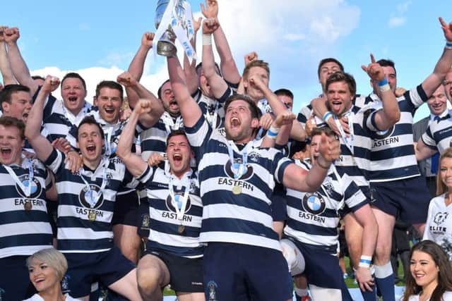 Heriots captain Jack Turley celebrates with his team-mates after winning the BT Premiership Grand Final. Under the Super League proposals, Edinburgh could be represented by just two clubs Photograph: SNS