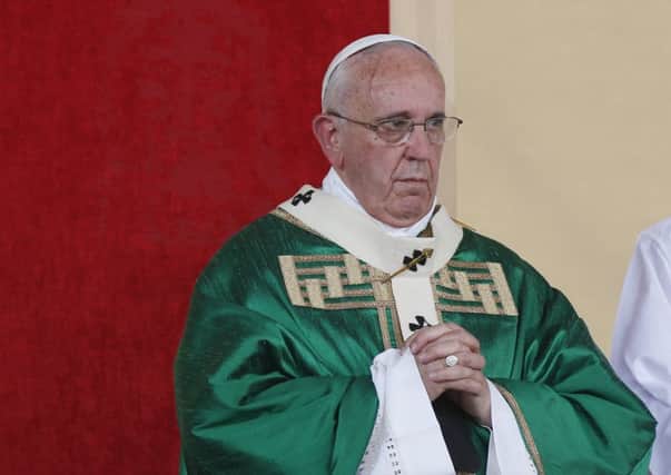 Pope Francis celebrates mass in Turin before praying before the citys famous shroud. Picture: AP