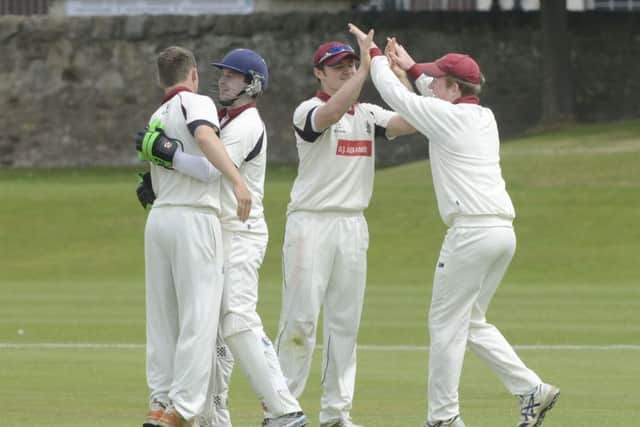 Watsonians celebrate Carltons Hamish Gardiner being caught in their encounter at Myreside, where Carlton won by 44 runs. Picture: Andrew OBrien