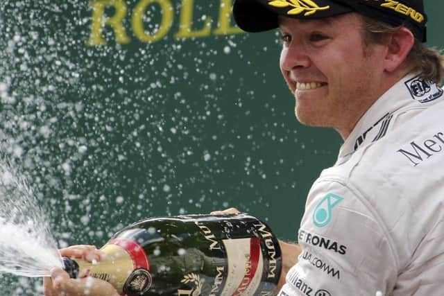 Mercedes driver Nico Rosberg celebrates his victory following the Austrian Formula One Grand Prix race in Spielberg. Picture: AP