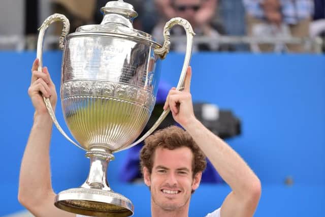 Andy Murray raises the winners trophy after beating South Africa's Kevin Anderson . Picture: Getty