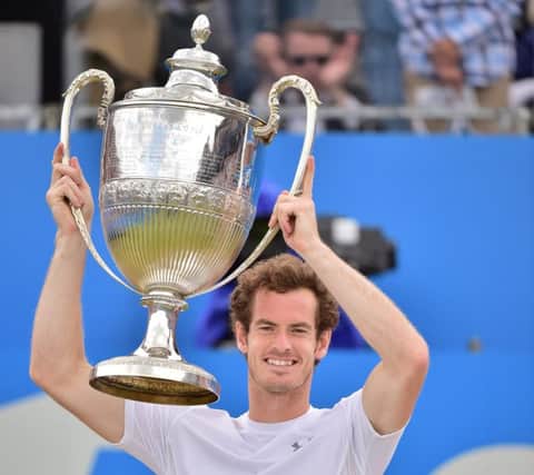 Andy Murray raises the winners trophy after beating South Africa's Kevin Anderson . Picture: Getty