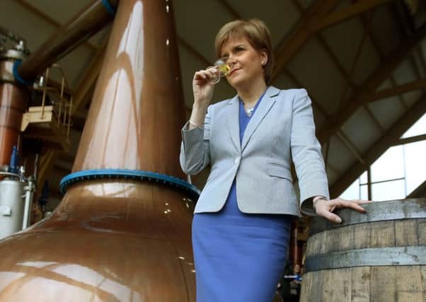 First Minister Nicola Sturgeon with at the launch of the Dalmunach Distillery. Picture: PA