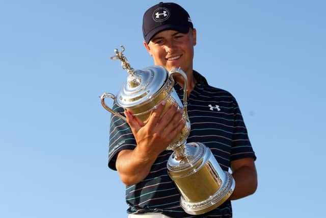 Jordan Spieth only has eyes for the US Open trophy after his dramatic win on Sunday. Picture: Getty Images
