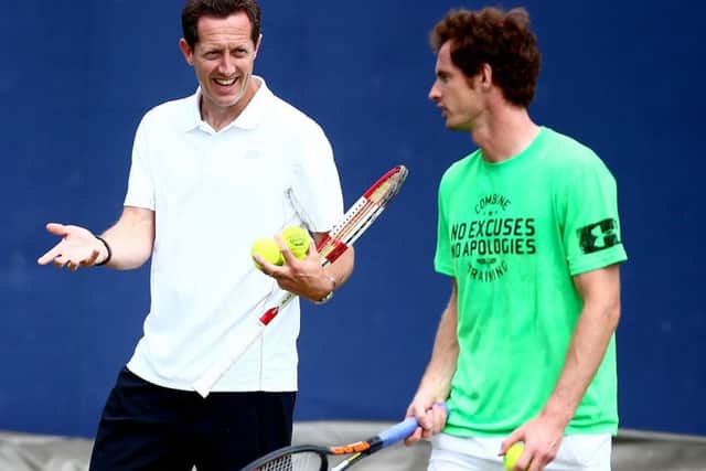 Andy Murray talks with coach Jonas Bjorkman at Queens Club. Picture: Getty Images