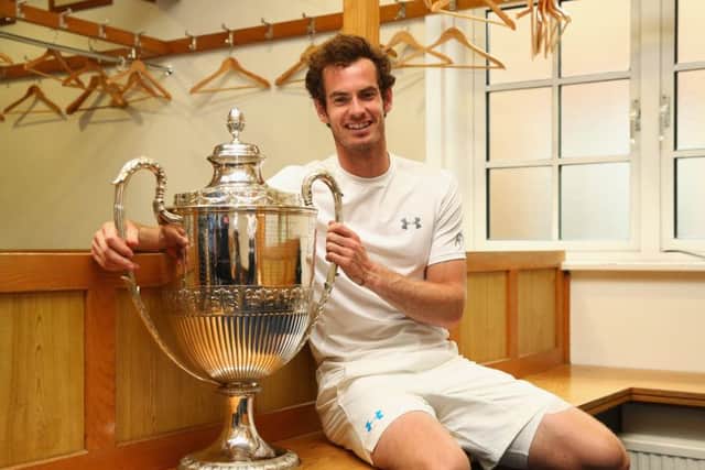 Andy Murray relaxes in the Queens Club locker room after his victory over Kevin Anderson in Sundays final. Picture: Clive Brunskill/Getty