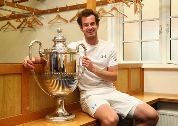 Andy Murray relaxes in the Queens Club locker room after his victory over Kevin Anderson in Sundays final. Picture: Clive Brunskill/Getty