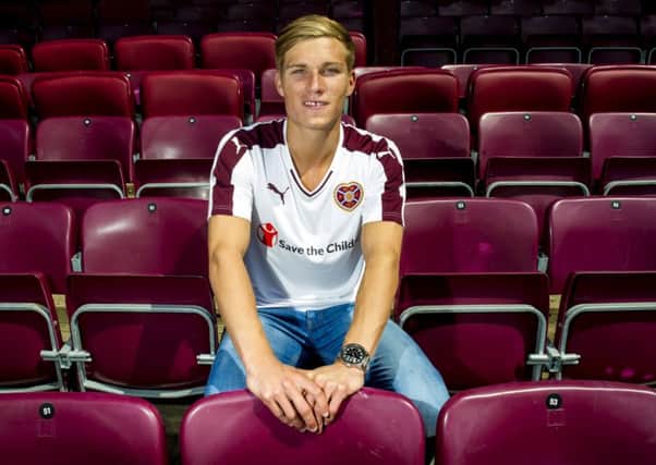 Gavin Reilly finally completed his protracted move to Hearts from Queen of the South after compensation was agreed. Picture: SNS Group