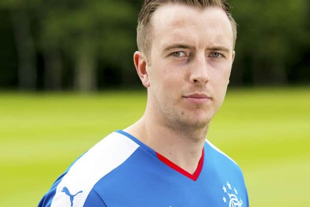 Danny Wilson gets the feel for a light blue jersey again at Murray Park yesterday. Picture: SNS