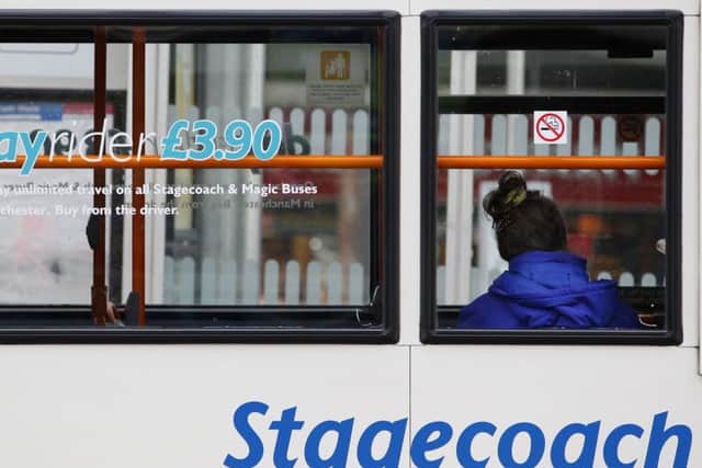 Passengers quit public transport for cars as petrol prices fell. Picture: PA