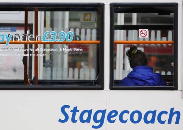 Passengers quit public transport for cars as petrol prices fell. Picture: PA