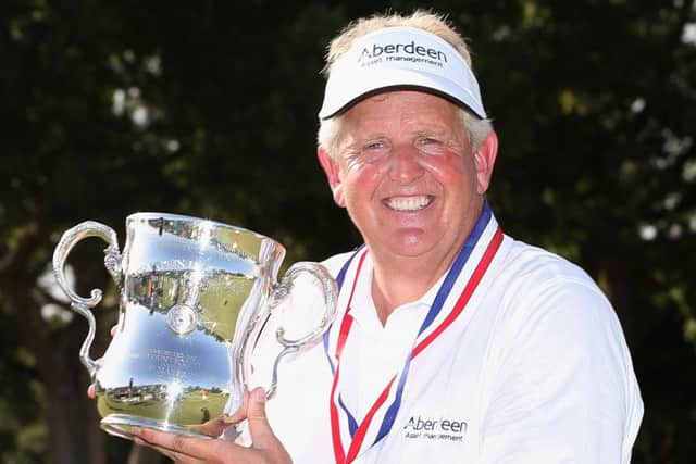 Colin Montgomerie poses with the trophy after winning the US Seniors Open last year. Picture: Getty