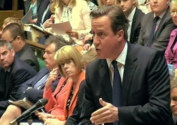 David Cameron poured scorn on the SNPs plans for what he called full fiscal shambles. Picture: PA