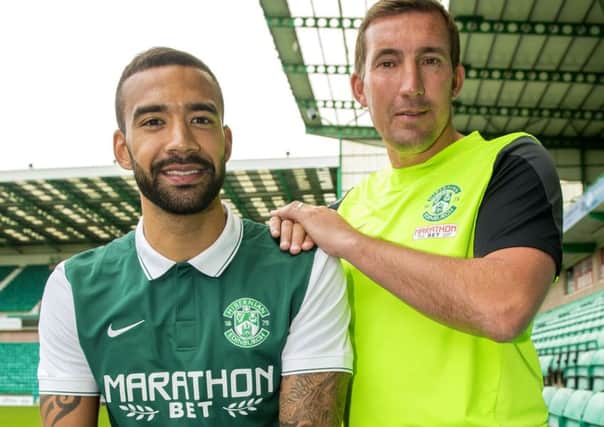 Liam Fontaine with manager Alan Stubbs after signing a new two-year deal at Hibernian. Picture: SNS Group