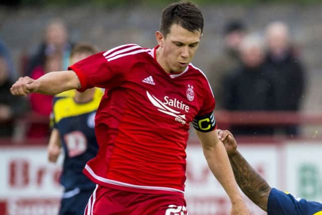 Jack wore the armband in last night's win over Brechin City. Picture: SNS