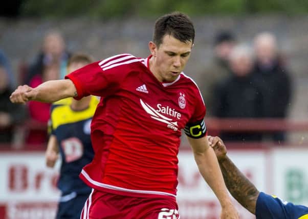 Jack wore the armband in last night's win over Brechin City. Picture: SNS