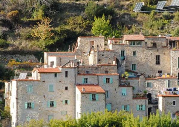 Villagers from 13th century Torri Superiore in southern Italy live according to sustainable principles which include farming organically. Picture: Contributed