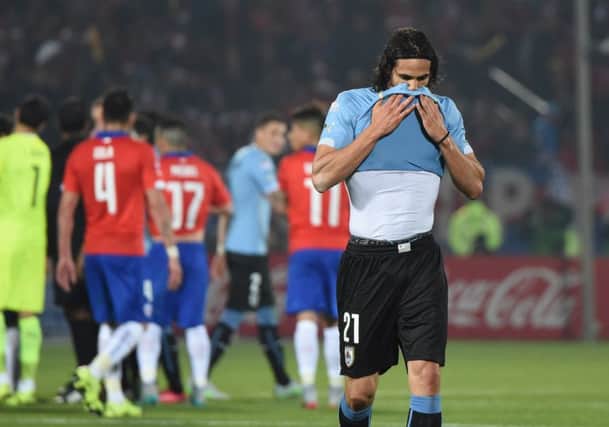 Uruguayan forward Edinson Cavani was sent off in the Copa American quarterfinal defeat by Chile. AFP/Getty Images