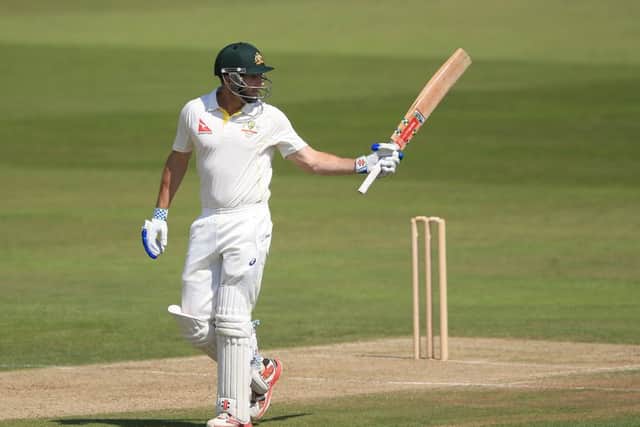 Australian opener Shaun Marsh acknowledges the applause after reaching his hundred against Kent yesterday. Picture: Nigel French/PA