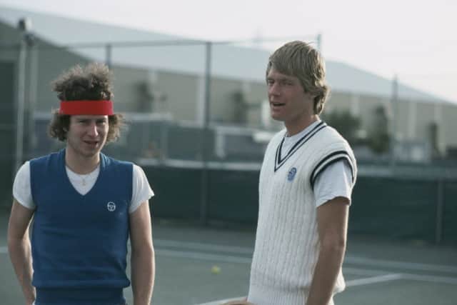 Fleming with McEnroe in 
1980. Picture: Getty