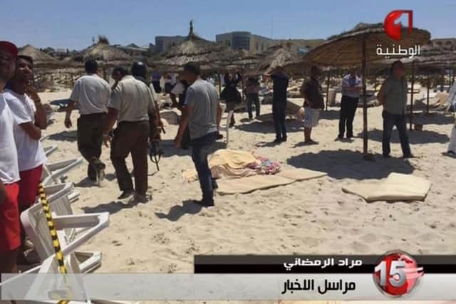 Two gunmen rushed from the beach into a hotel in the Tunisian resort town of Sousse. Picture: Tunisia TV1/AP