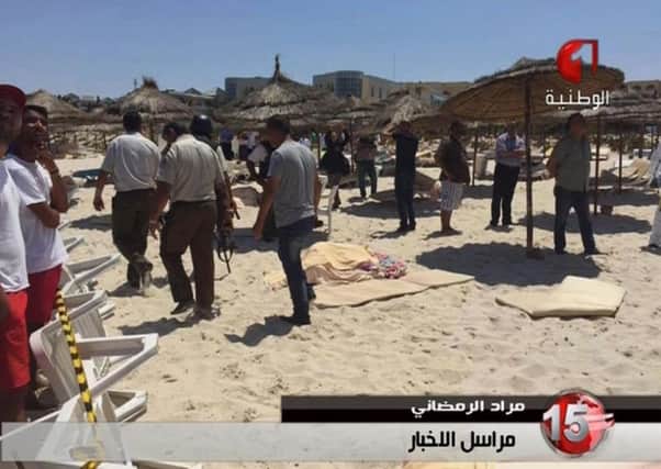 Two gunmen rushed from the beach into a hotel in the Tunisian resort town of Sousse. Picture: Tunisia TV1/AP