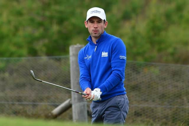 Leading Scot Ross Kellett pitches to the eighth green on his way to a 67. Picture: Getty
