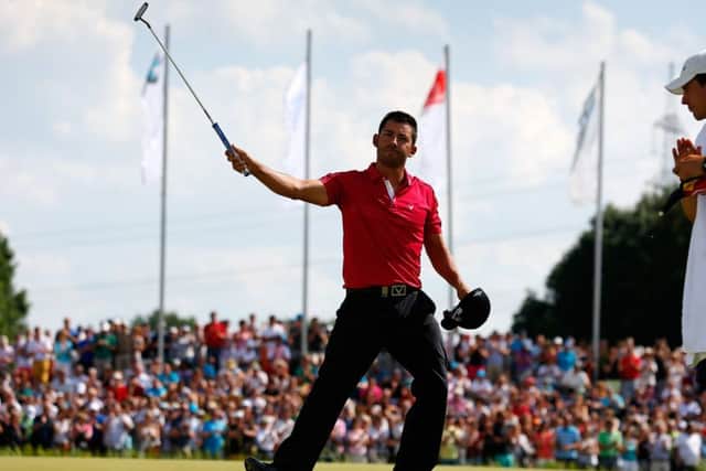 Munich winner Pablo Larrazabal acknowledges the crowd on the 18th hole after his 66. Picture: Getty