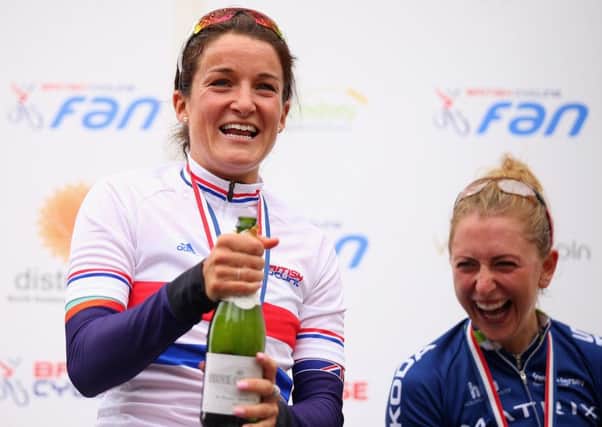 Lizzie Armitstead celebrates alongside second placed Laura Trott after winning the womens road race. Picture: Getty