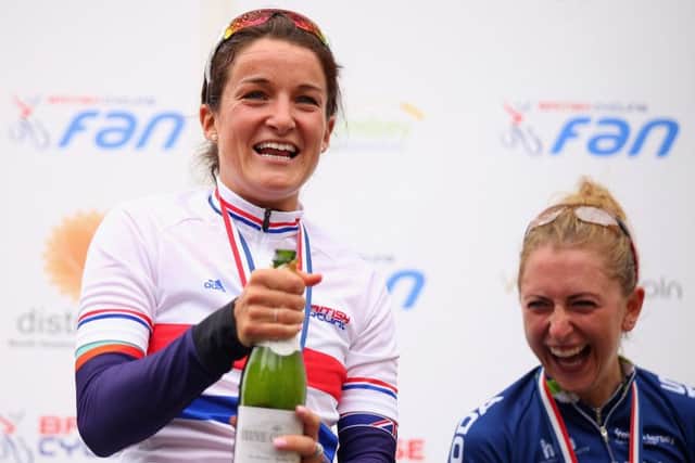Lizzie Armitstead celebrates alongside second placed Laura Trott after winning the womens road race. Picture: Getty