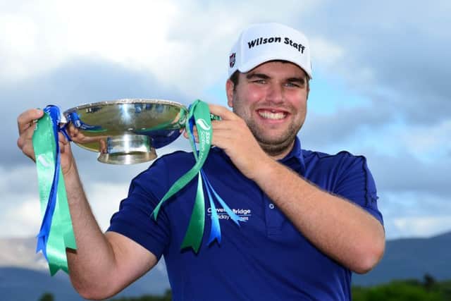 Jack Senior poses with the SSE Scottish Hydro Challenge trophy at Macdonald Spey Valley. Picture: Getty