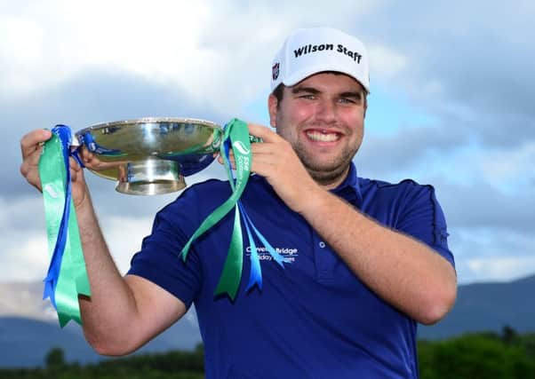 Jack Senior poses with the SSE Scottish Hydro Challenge trophy at Macdonald Spey Valley. Picture: Getty
