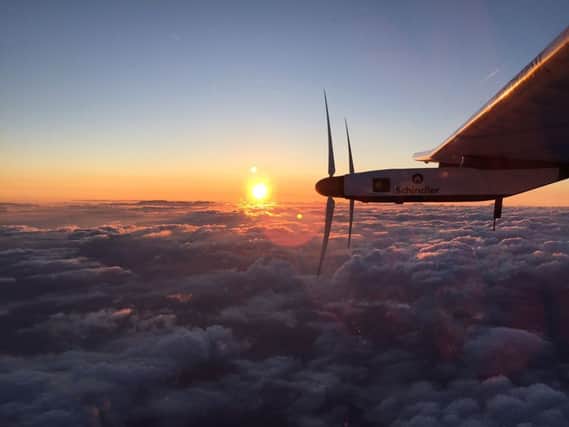 As the sun rises yesterday, the Solar Impulse continues its Pacific journey. Picture: AFP/Getty