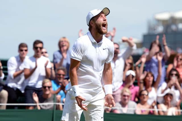 British wild card Liam Broady roars with delight as he seals victory over Marinko Matosevic. Picture: PA