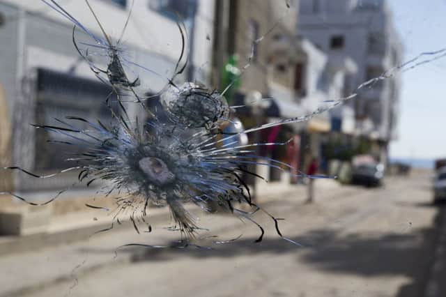 A bullet-hole in a windscreen of a car in Sousse where this week a gunman murdered holidaymakers in a killing spree.
