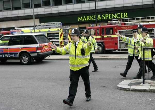 File photo of police dealing with the aftermath of the 7/7 terror attack in London in July 2005. Picture: PA