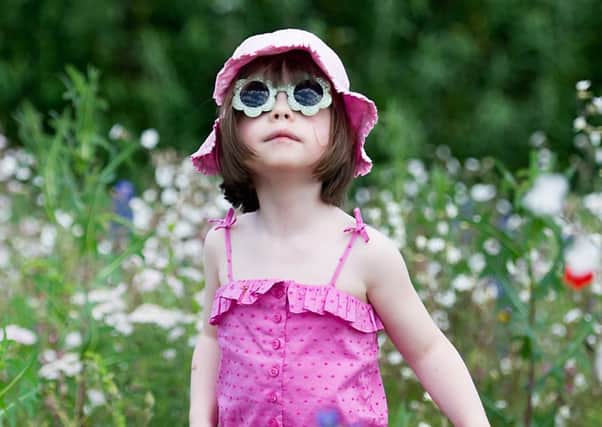 Hat, sunglasses, sun cream  the checklist for summer is endless. Picture: John Devlin