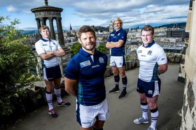 From l-r: Scotland stars Jonny Gray, Ross Ford, Richie Gray and Stuart Hogg offically unveil the new kit the national side will compete in at the upcoming Rugby World Cup 2015. Picture: SNS