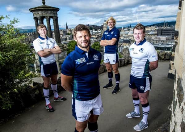 From l-r: 
Scotland stars Jonny Gray, Ross Ford, Richie Gray and Stuart Hogg offically unveil the new kit the national side will compete in at the upcoming Rugby World Cup 2015. Picture: SNS