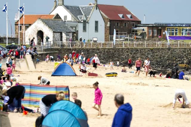 People enjoying the sunshine on North Berwick beach, East Lothian as temperatures soared to nearly 30C. Picture: Jane Barlow