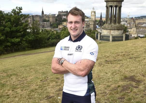 Stuart Hogg models Scotland's new strip for the World Cup at the top of Calton Hill. Picture: Greg Macvean