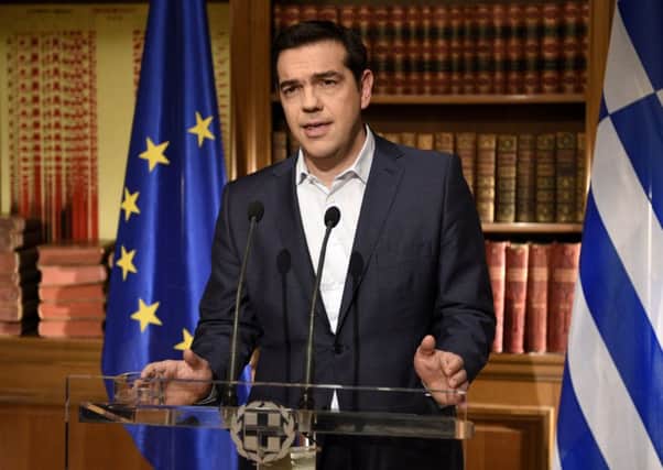 Greek Prime Minister Alexis Tsipras delivers a televised address to the nation from his office at Maximos Mansion on July 1, 2015. Picture: Getty Images