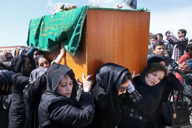 Women's rights activists carry Farkhunda's coffin in March. Picture: AP